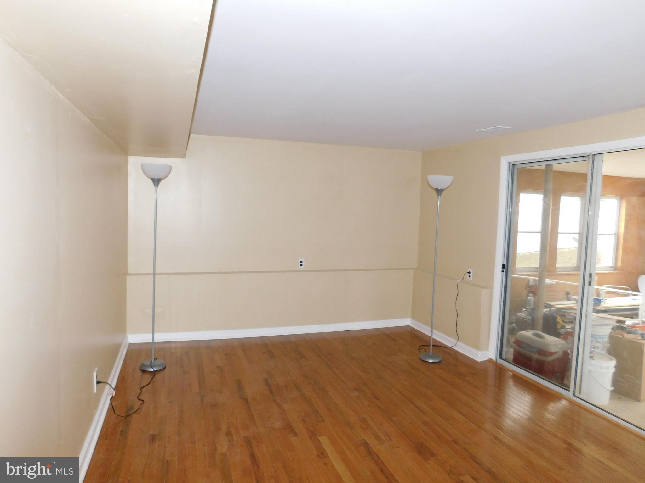 348 Independence Boulevard Lawnside, NJ 08045 - Photo 26 of 33 family room sliding doors - enclosed BONUS ROOM