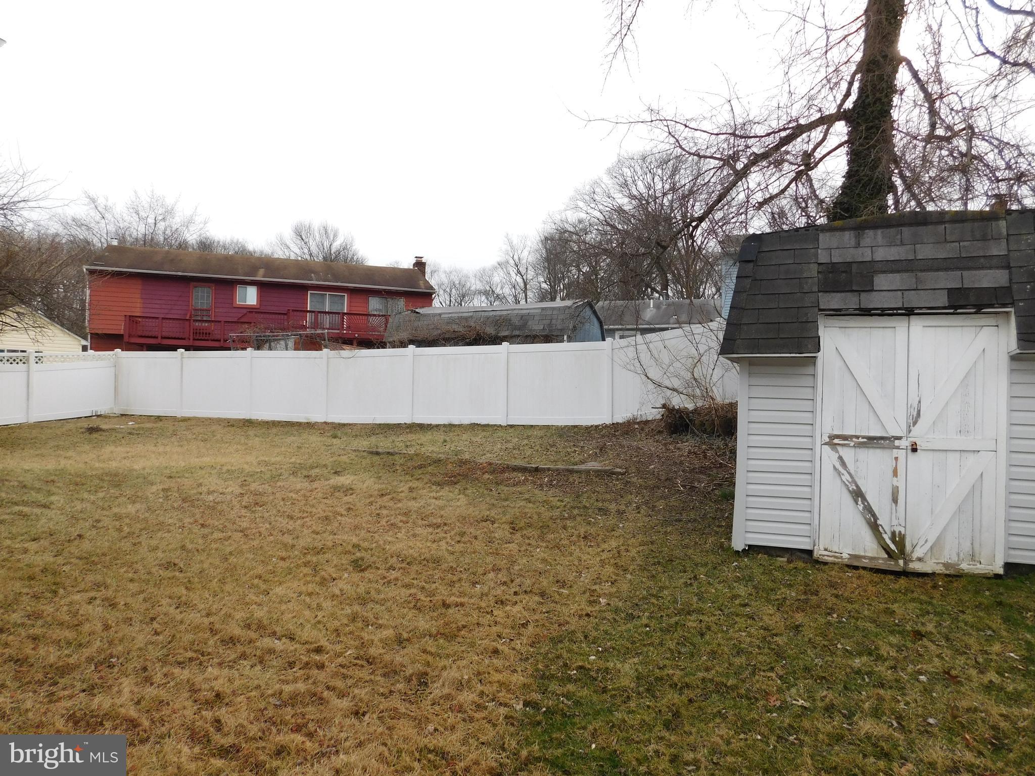 348 Independence Boulevard Lawnside, NJ 08045 - Photo 31 of 33 Fenced backyard with shed