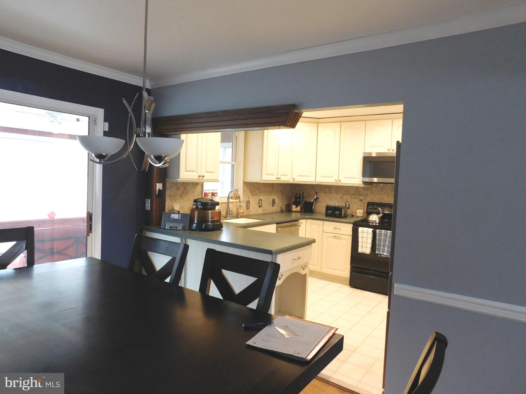 348 Independence Boulevard Lawnside, NJ 08045 - Photo 9 of 33 dining area open to the kitchen
