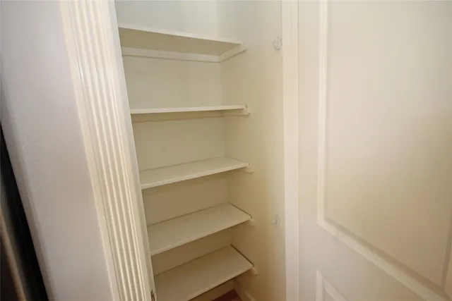view of a bathroom with a sink and a window