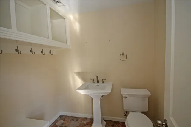 a bathroom with a sink double vanity and a bathtub