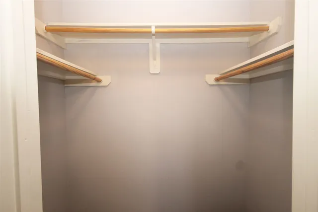 a view of a swimming pool with an outdoor seating