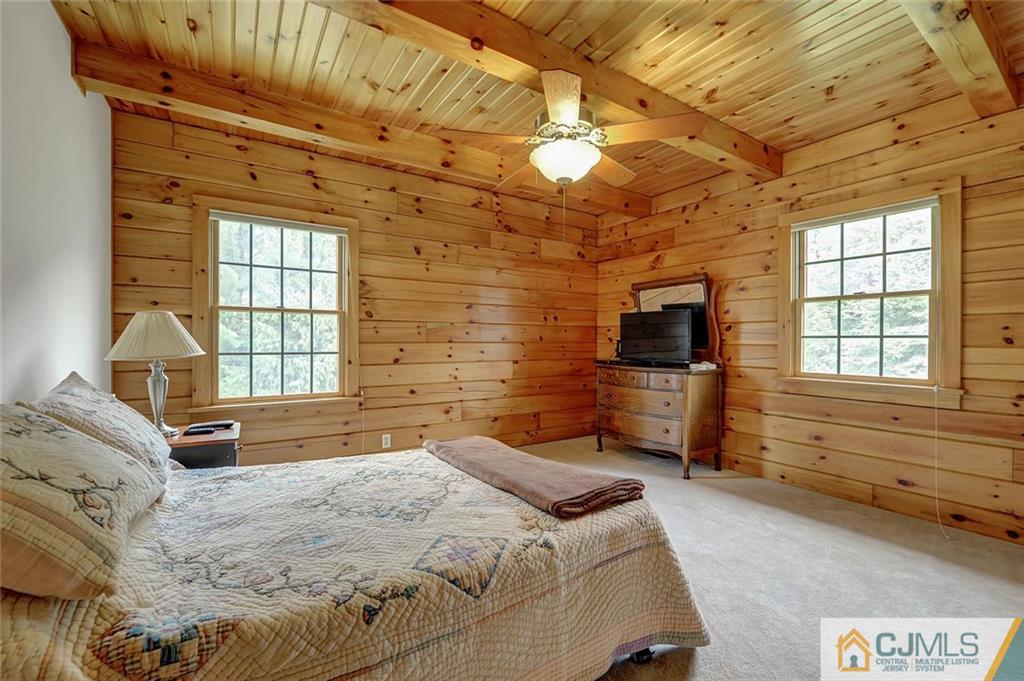 4 Hampton Road Pittstown, NJ 08867 - Photo 14 of 25 a bedroom with a bed and a television