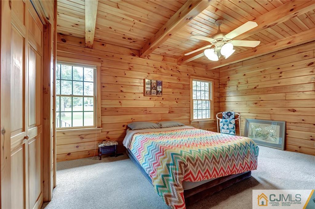 4 Hampton Road Pittstown, NJ 08867 - Photo 15 of 25 a bedroom with a bed and a window