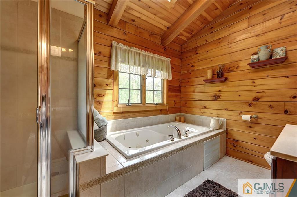 4 Hampton Road Pittstown, NJ 08867 - Photo 19 of 25 a bathroom with a bathtub and a shower