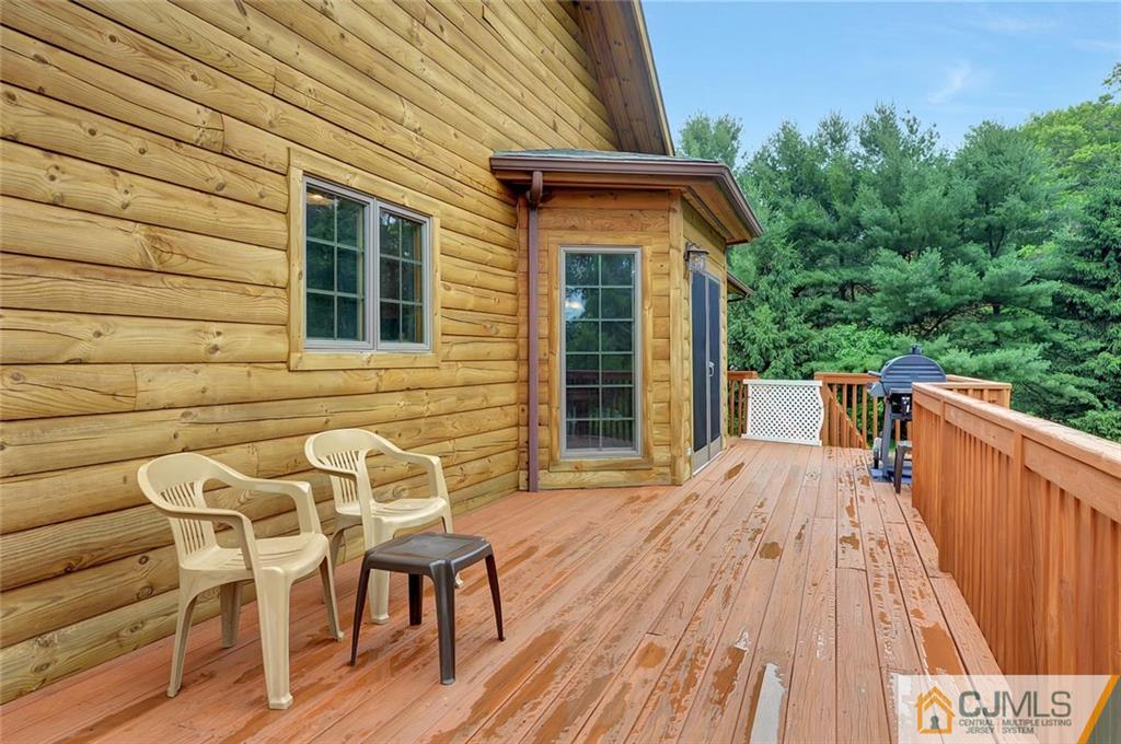 4 Hampton Road Pittstown, NJ 08867 - Photo 22 of 25 a balcony with table and chairs