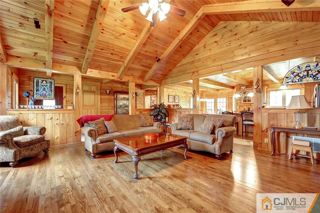 4 Hampton Road Pittstown, NJ 08867 - Photo 6 of 25 a living room with furniture and a wooden floor