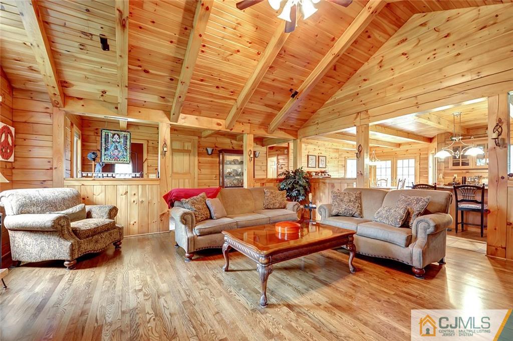 4 Hampton Road Pittstown, NJ 08867 - Photo 7 of 25 a living room with furniture and a wooden floor