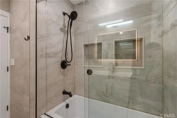 a view of a backyard of the house