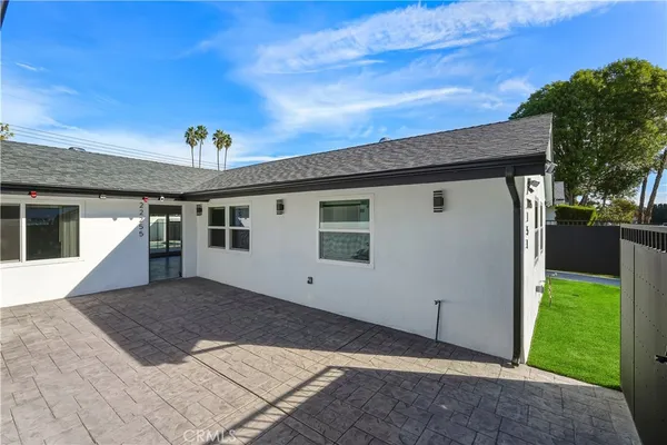 a view of a stairs and an entrance door of a house