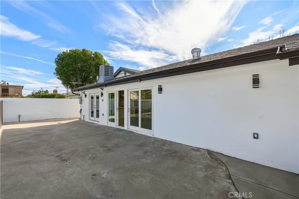a view of a swimming pool with a chairs