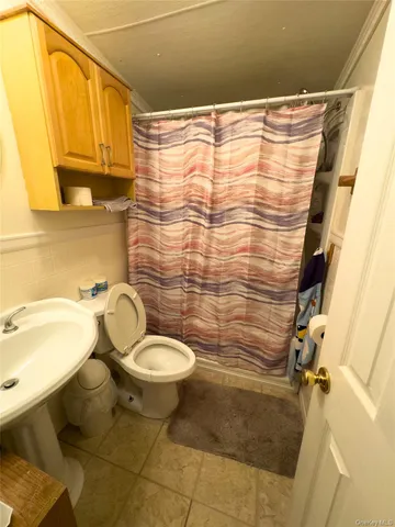 a bathroom with a sink and a shower