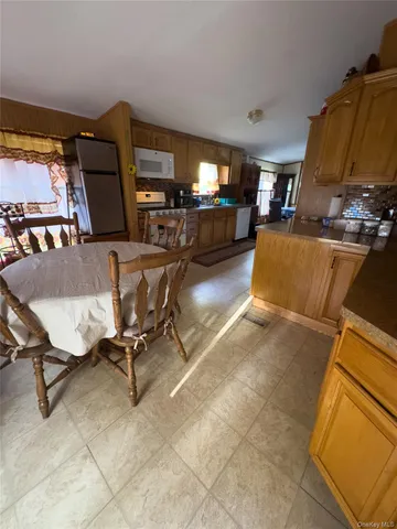 a view of a livingroom with furniture and a couch