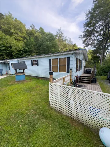 a view of a house with a patio