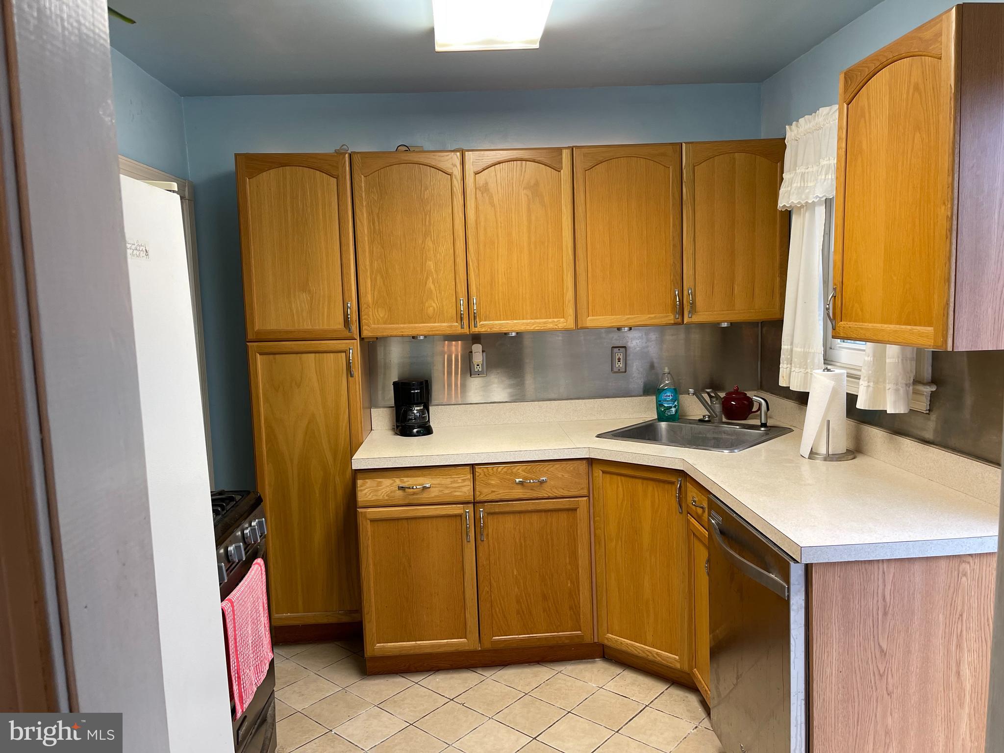 8003 Old Harford Road Baltimore, MD 21234 - Photo 6 of 74 Kitchen View with Lights on From Dining Room