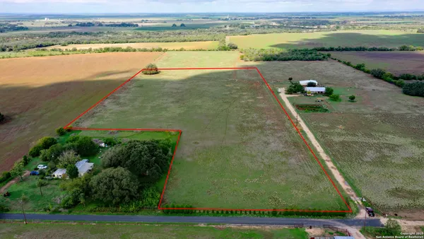 a view of a lake with a big yard