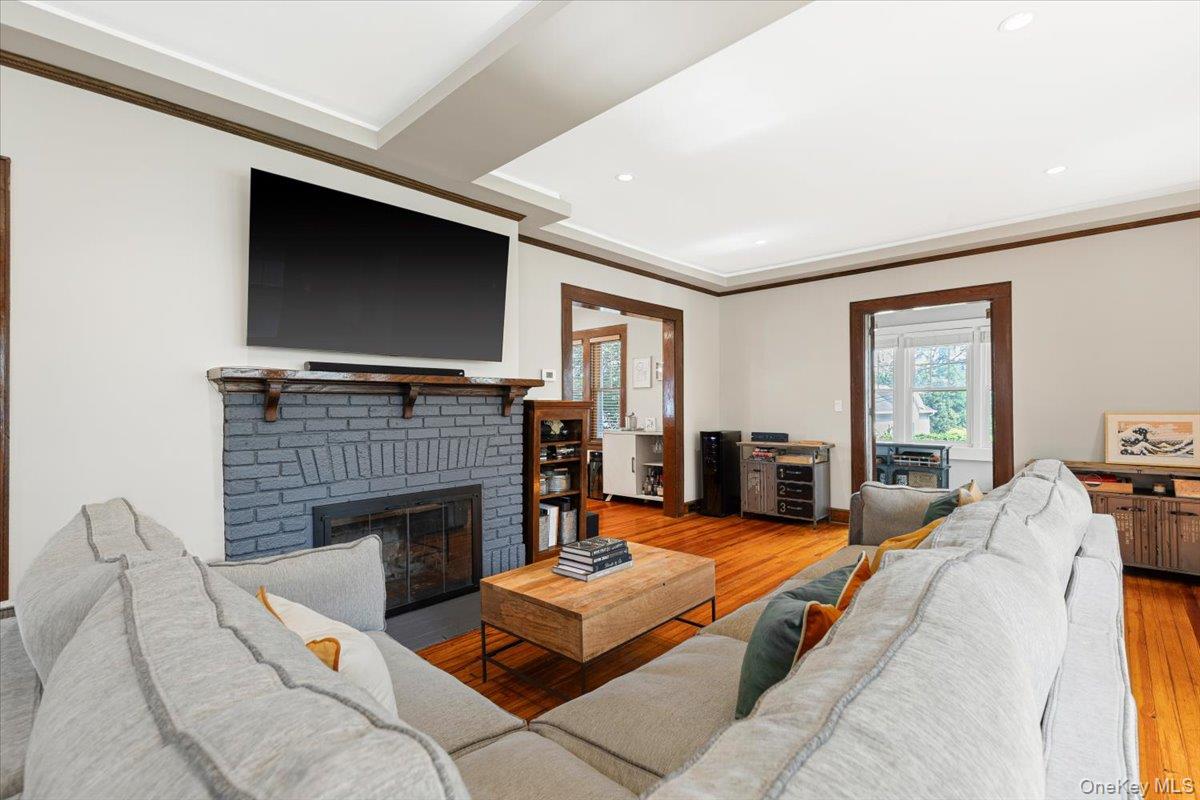 13 Harrison Street Tuckahoe, NY 10707 - Photo 15 of 44 a living room with furniture fireplace and flat screen tv