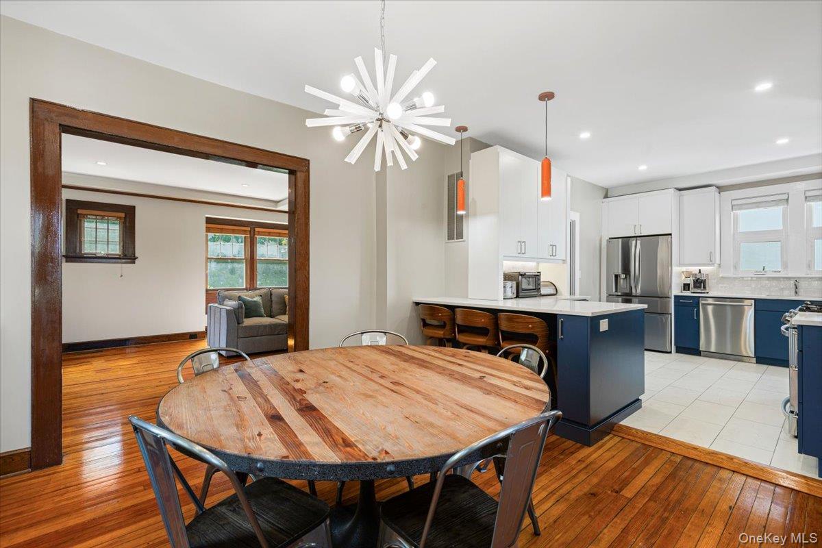 13 Harrison Street Tuckahoe, NY 10707 - Photo 18 of 44 a kitchen with a table and chairs in it