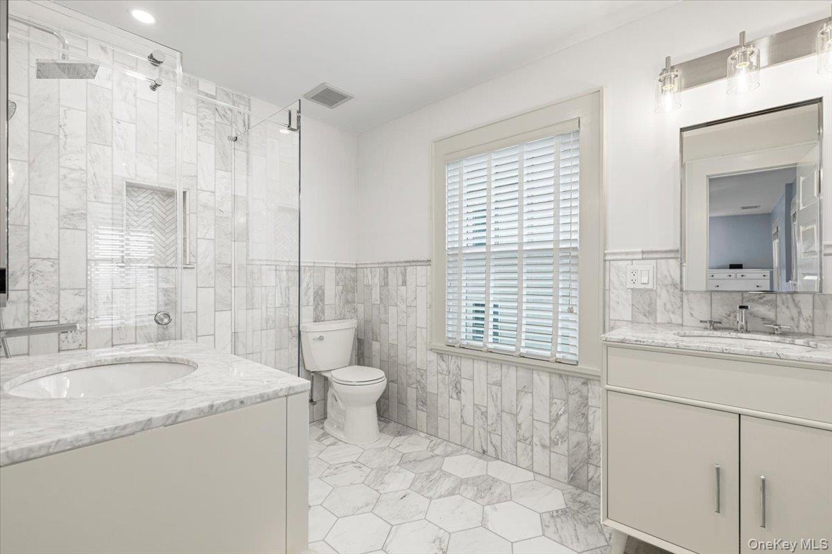 13 Harrison Street Tuckahoe, NY 10707 - Photo 29 of 44 a bathroom with a granite countertop sink toilet and shower