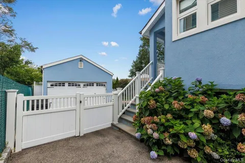 front view of a house with a small yard