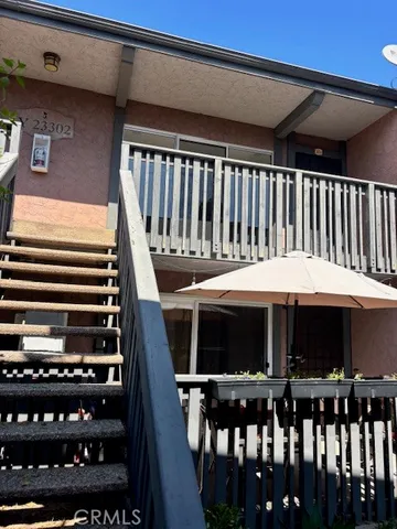 a view of a chairs and tables in the patio