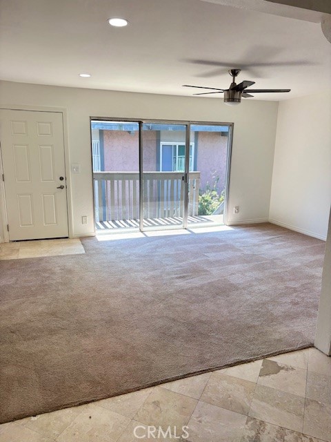 23302 Marigold Avenue, Unit Y204 Torrance, CA 90502 - Photo 5 of 16 a view of an empty room with a window