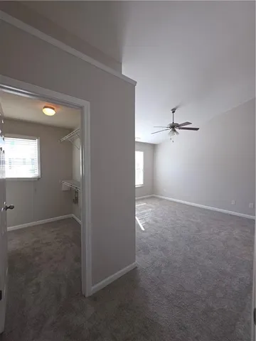 a view of empty room with windows