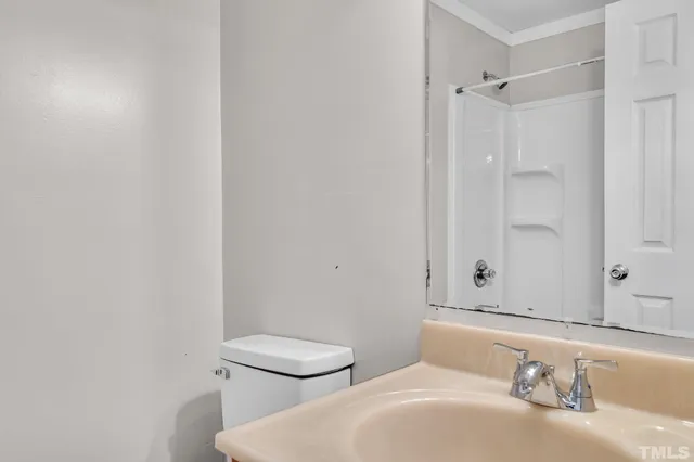 a bathroom with a sink and a toilet
