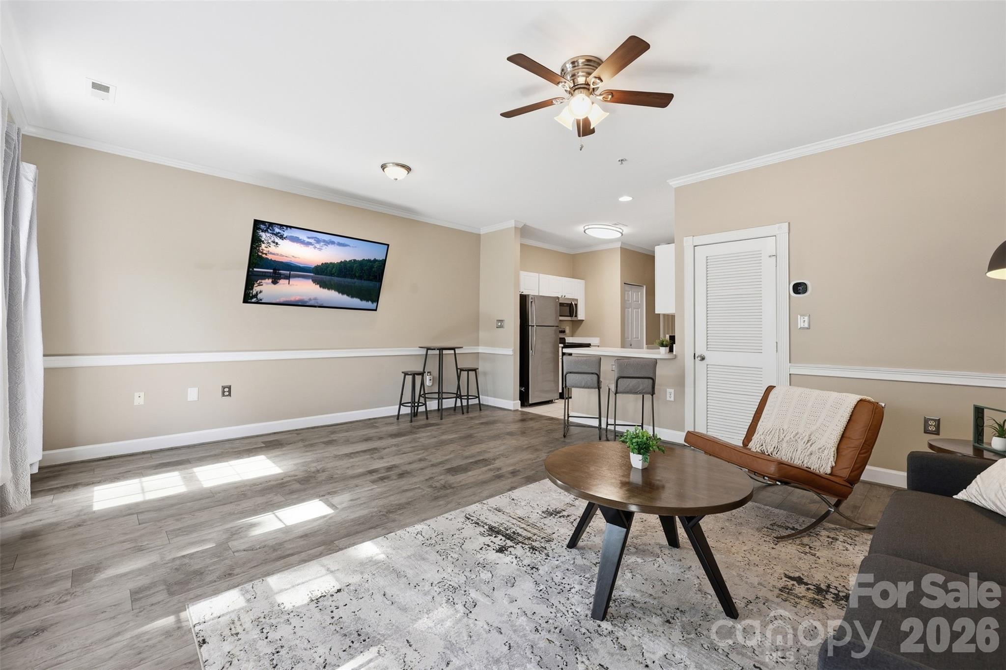 9054 Meadow Vista Road Charlotte, NC 28213 - Photo 13 of 30 a living room with furniture and a dining table