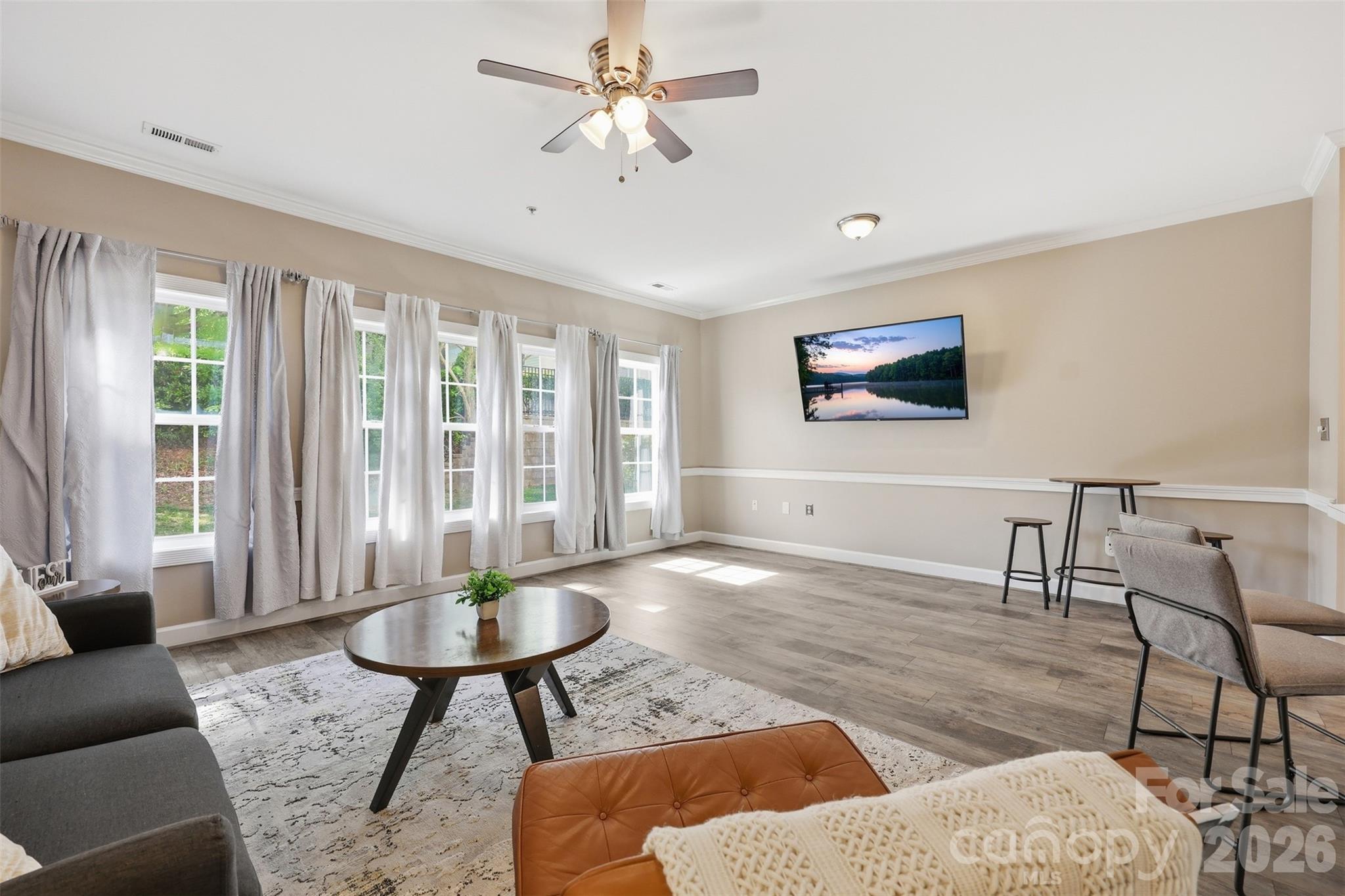 9054 Meadow Vista Road Charlotte, NC 28213 - Photo 14 of 30 a living room with furniture and a large window