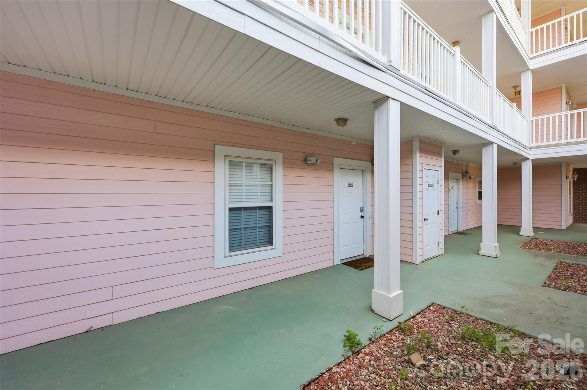 9054 Meadow Vista Road Charlotte, NC 28213 - Photo 25 of 30 a view of a house with a yard