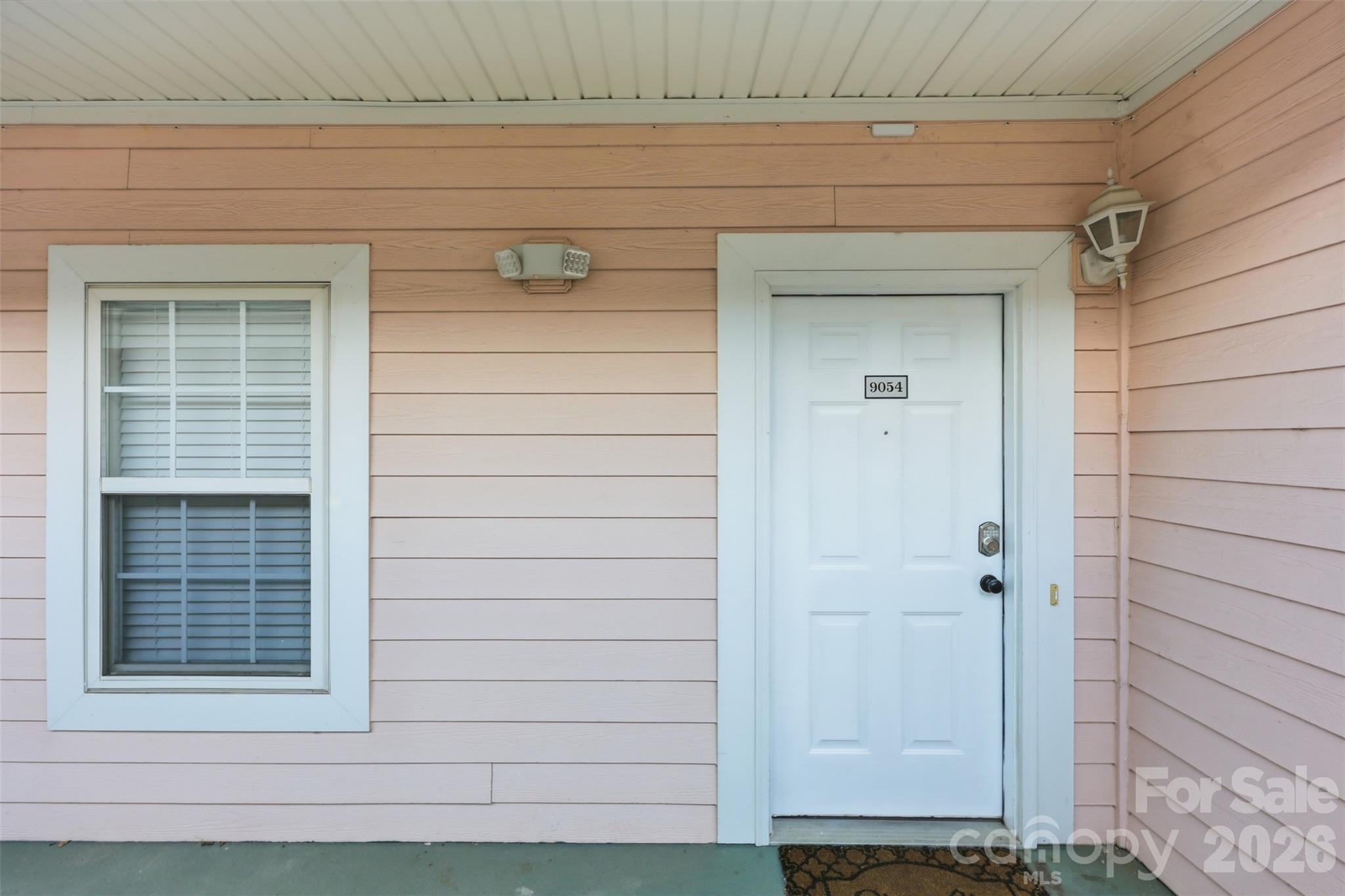 9054 Meadow Vista Road Charlotte, NC 28213 - Photo 26 of 30 a view of front door of a house