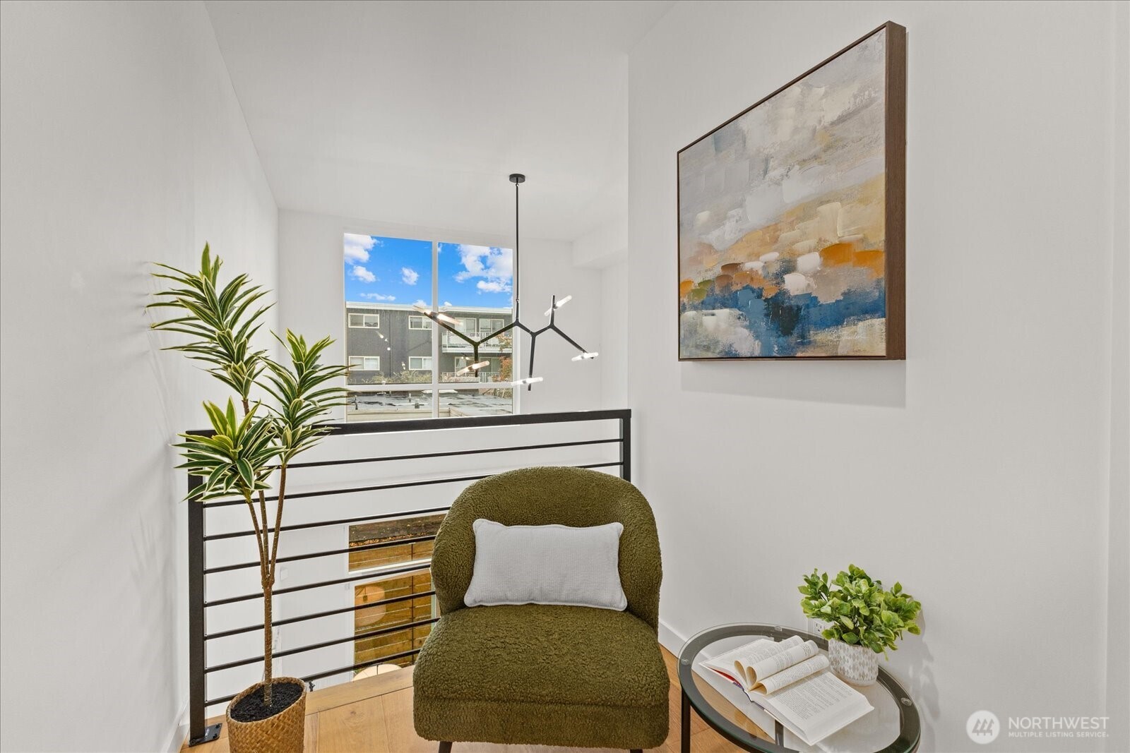 5439 California Avenue Southwest, Unit H Seattle, WA 98136 - Photo 13 of 23 a bedroom with a bed and a painting on the wall