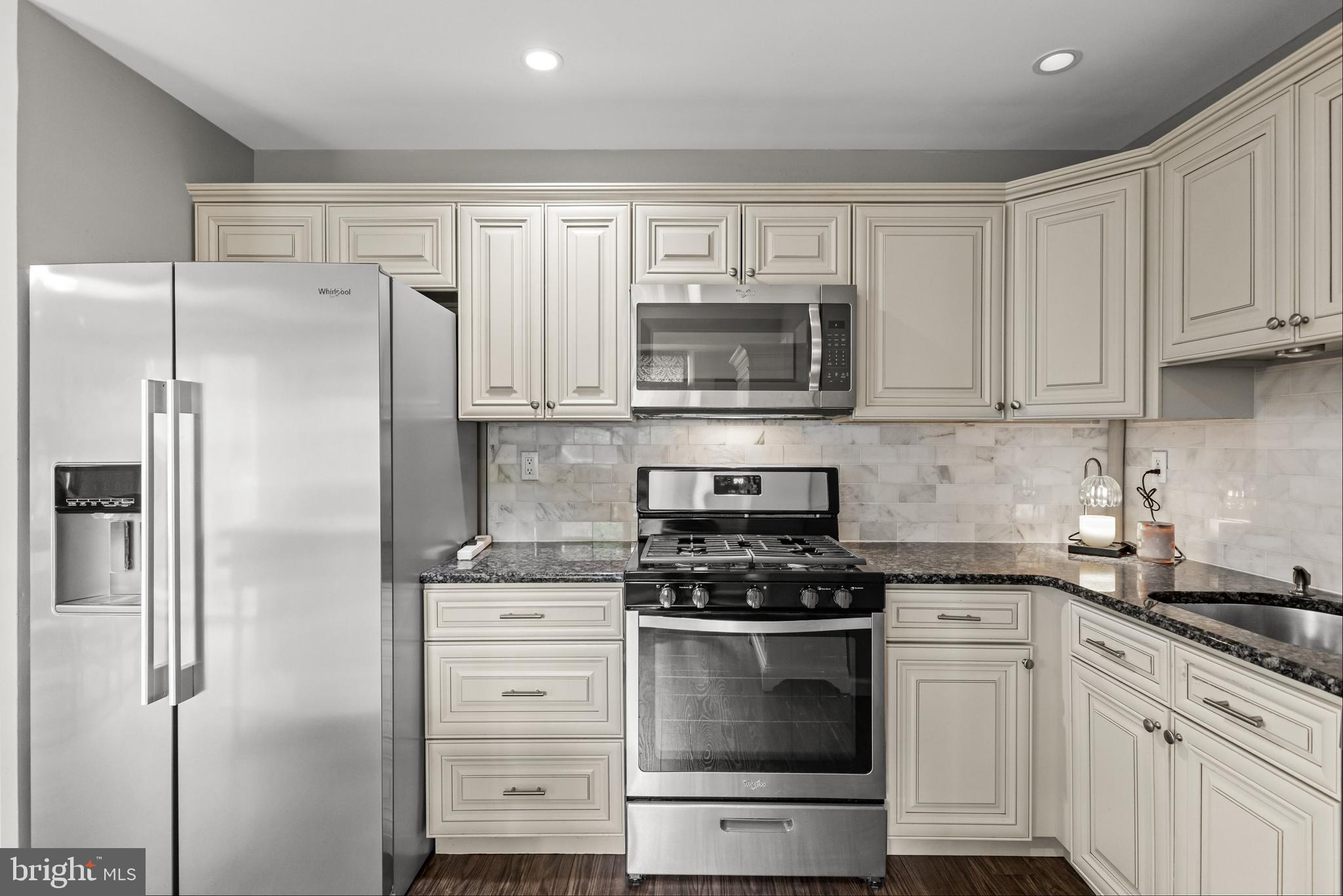 28 Windmill Clementon, NJ 08021 - Photo 14 of 28 a kitchen with cabinets stainless steel appliances and a counter space