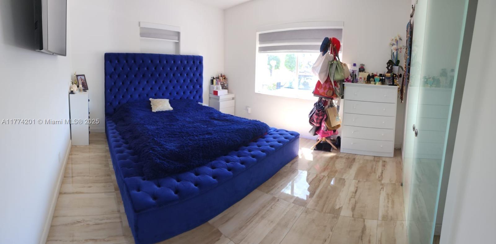 341 West 59th Street Hialeah, FL 33012 - Photo 18 of 44 a living room with furniture