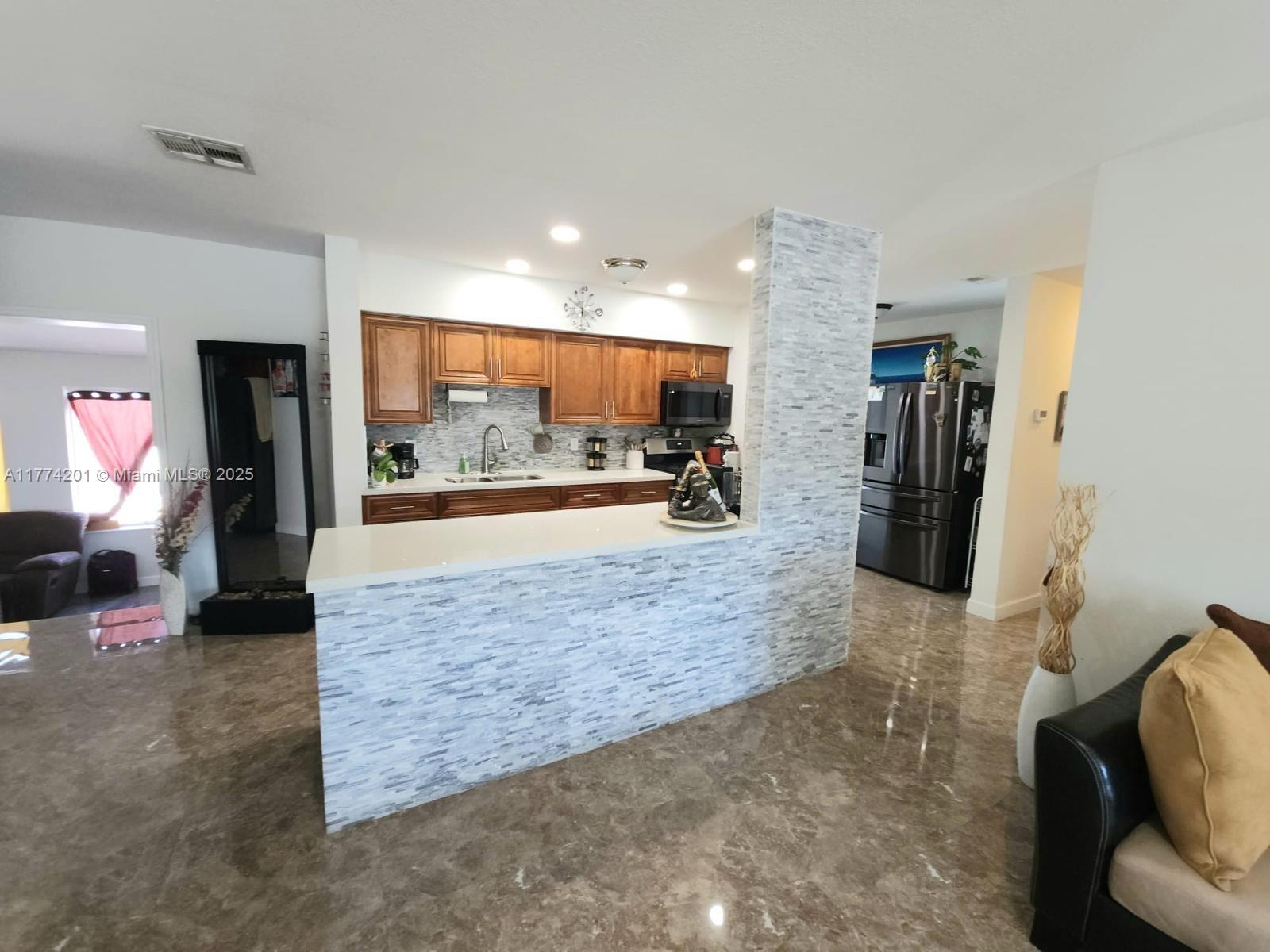 341 West 59th Street Hialeah, FL 33012 - Photo 34 of 44 a view of a living room