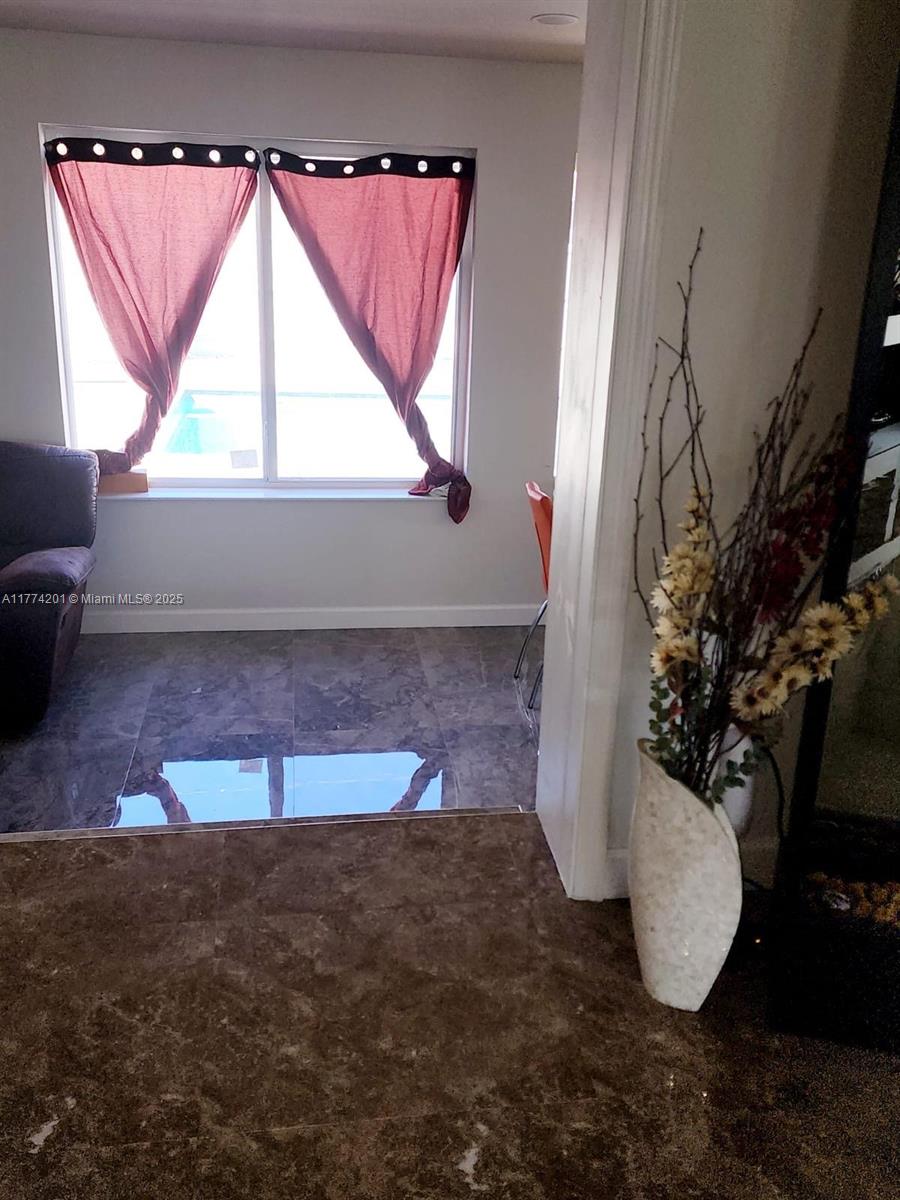 341 West 59th Street Hialeah, FL 33012 - Photo 35 of 44 a view of entryway and hall