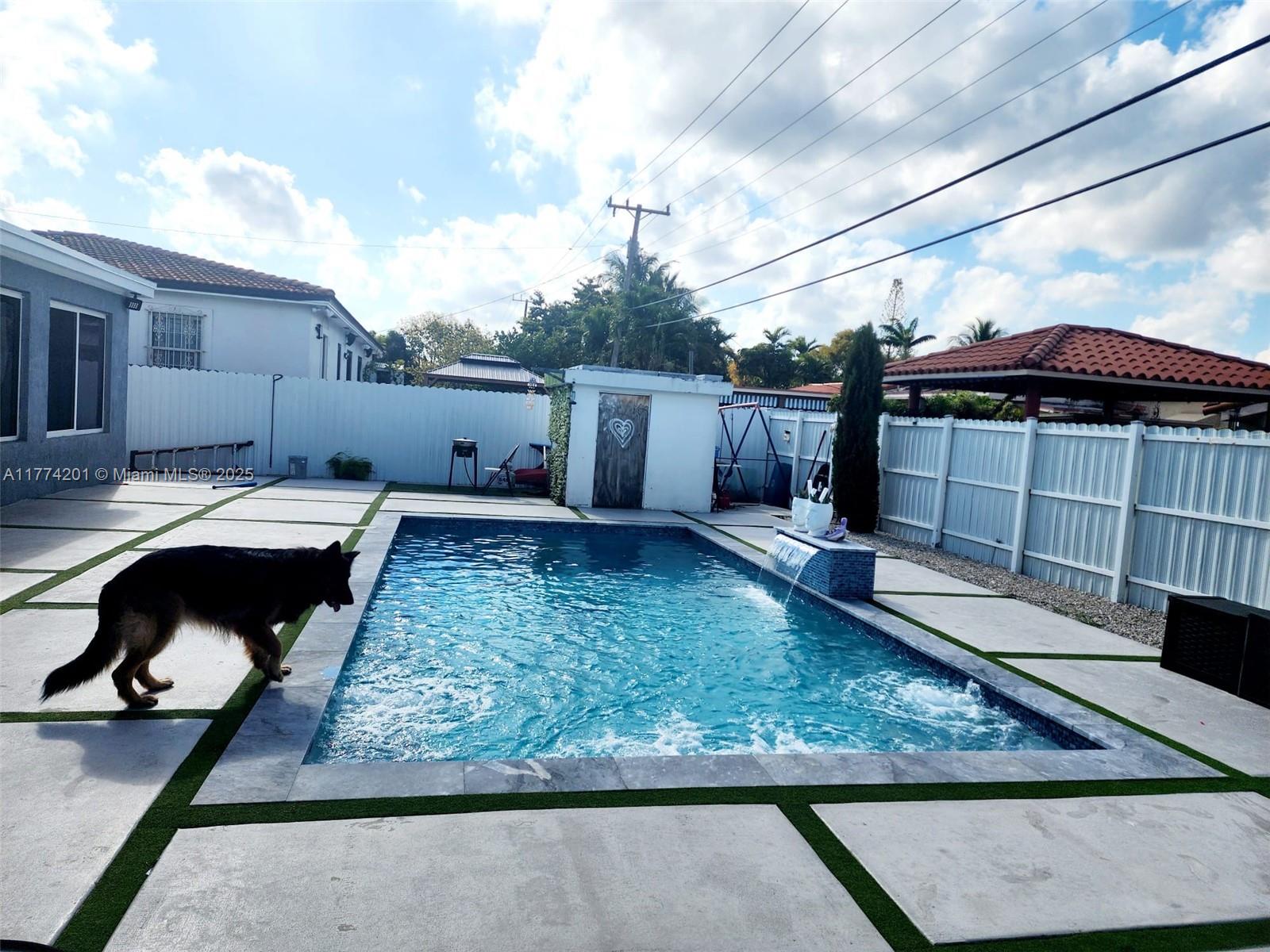 341 West 59th Street Hialeah, FL 33012 - Photo 38 of 44 a view of a backyard