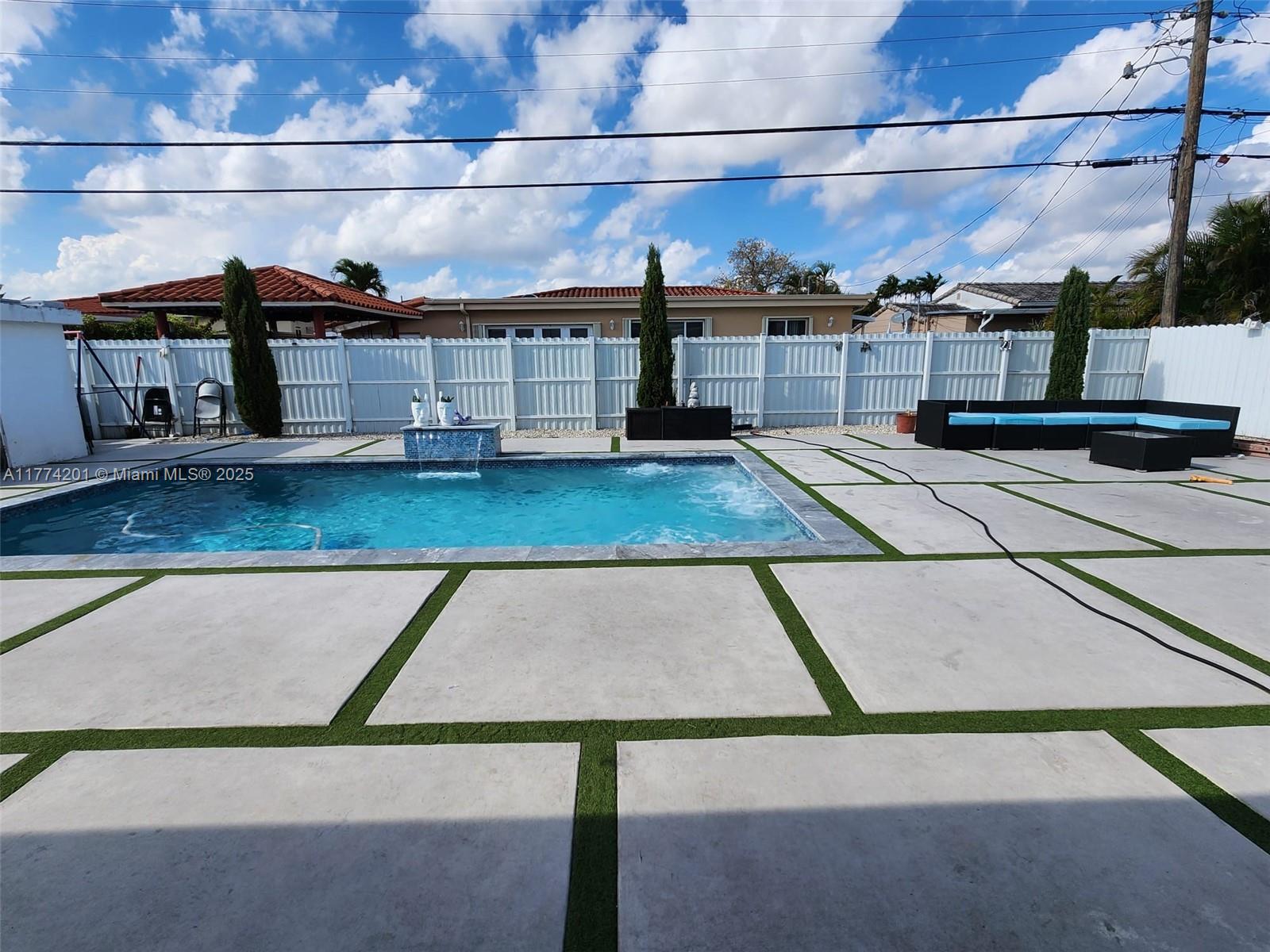 341 West 59th Street Hialeah, FL 33012 - Photo 44 of 44 a view of a swimming pool