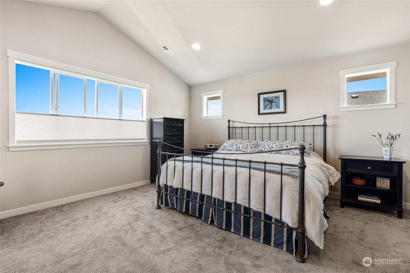 19012 123rd Avenue Southeast Renton, WA 98058 - Photo 17 of 40 a bedroom with a bed and cabinet