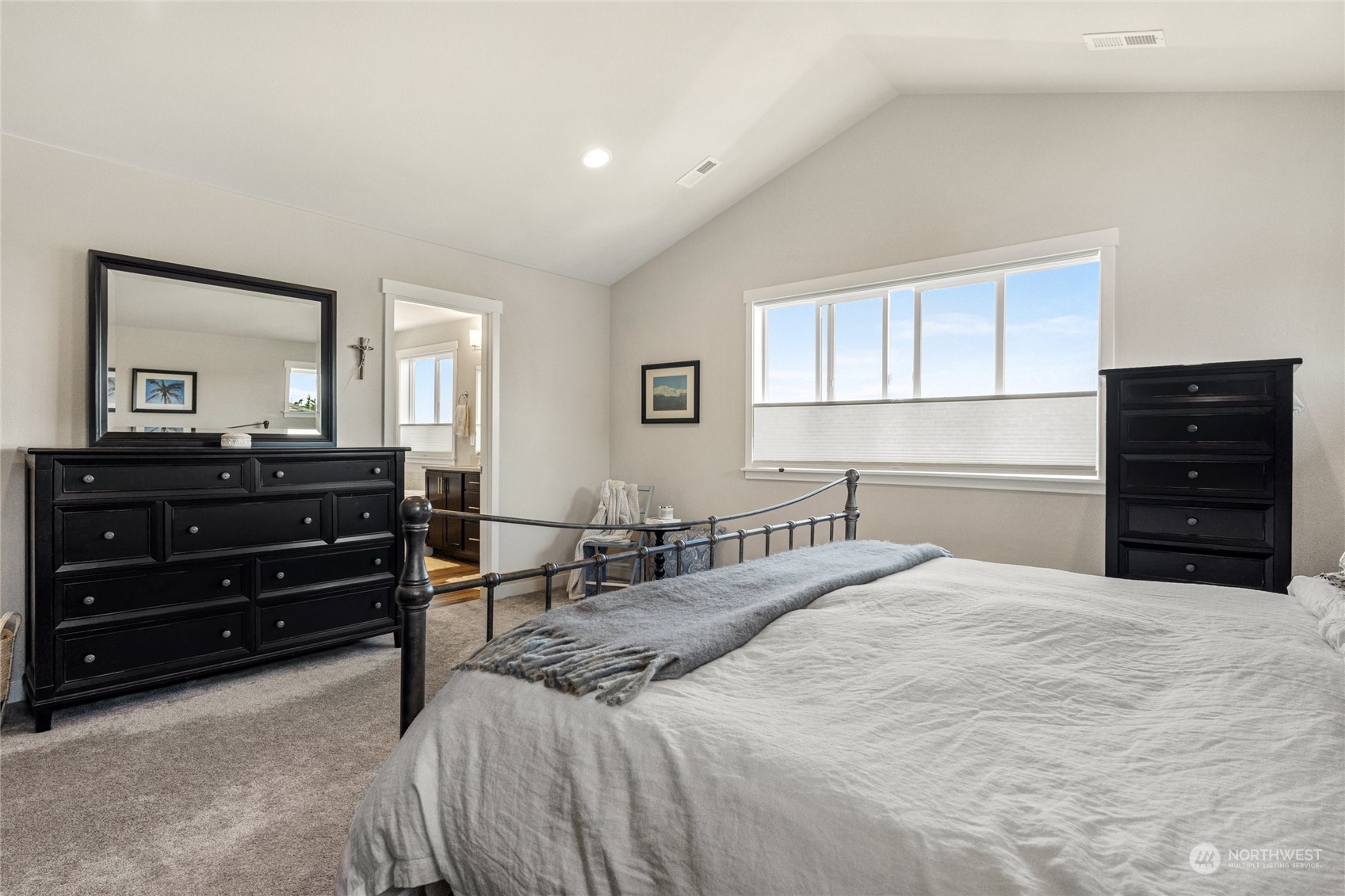 19012 123rd Avenue Southeast Renton, WA 98058 - Photo 18 of 40 a bedroom with a bed and a dresser