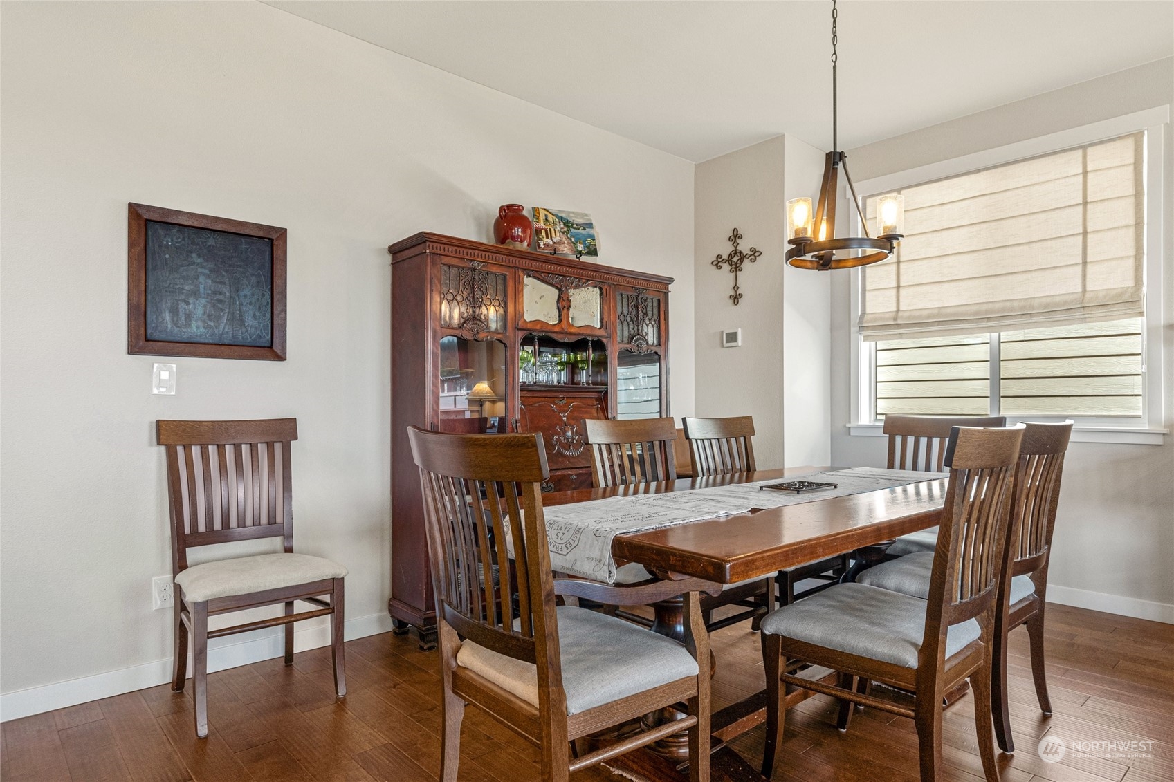19012 123rd Avenue Southeast Renton, WA 98058 - Photo 6 of 40 a view of a dining room with furniture window and wooden floor
