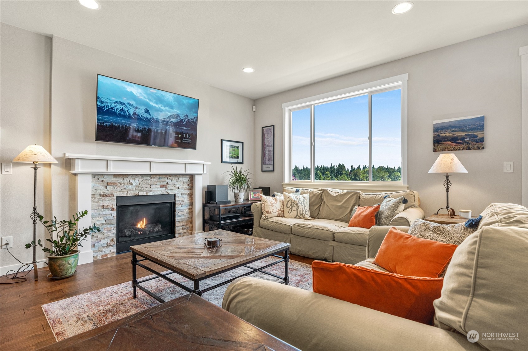 19012 123rd Avenue Southeast Renton, WA 98058 - Photo 7 of 40 a living room with furniture fireplace and window