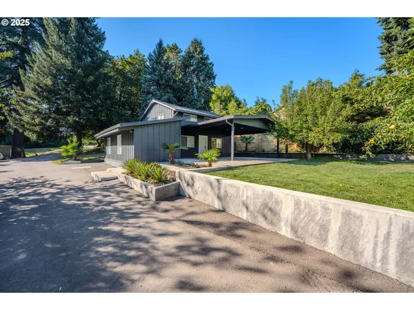 a view of kitchen with furniture and wooden floor