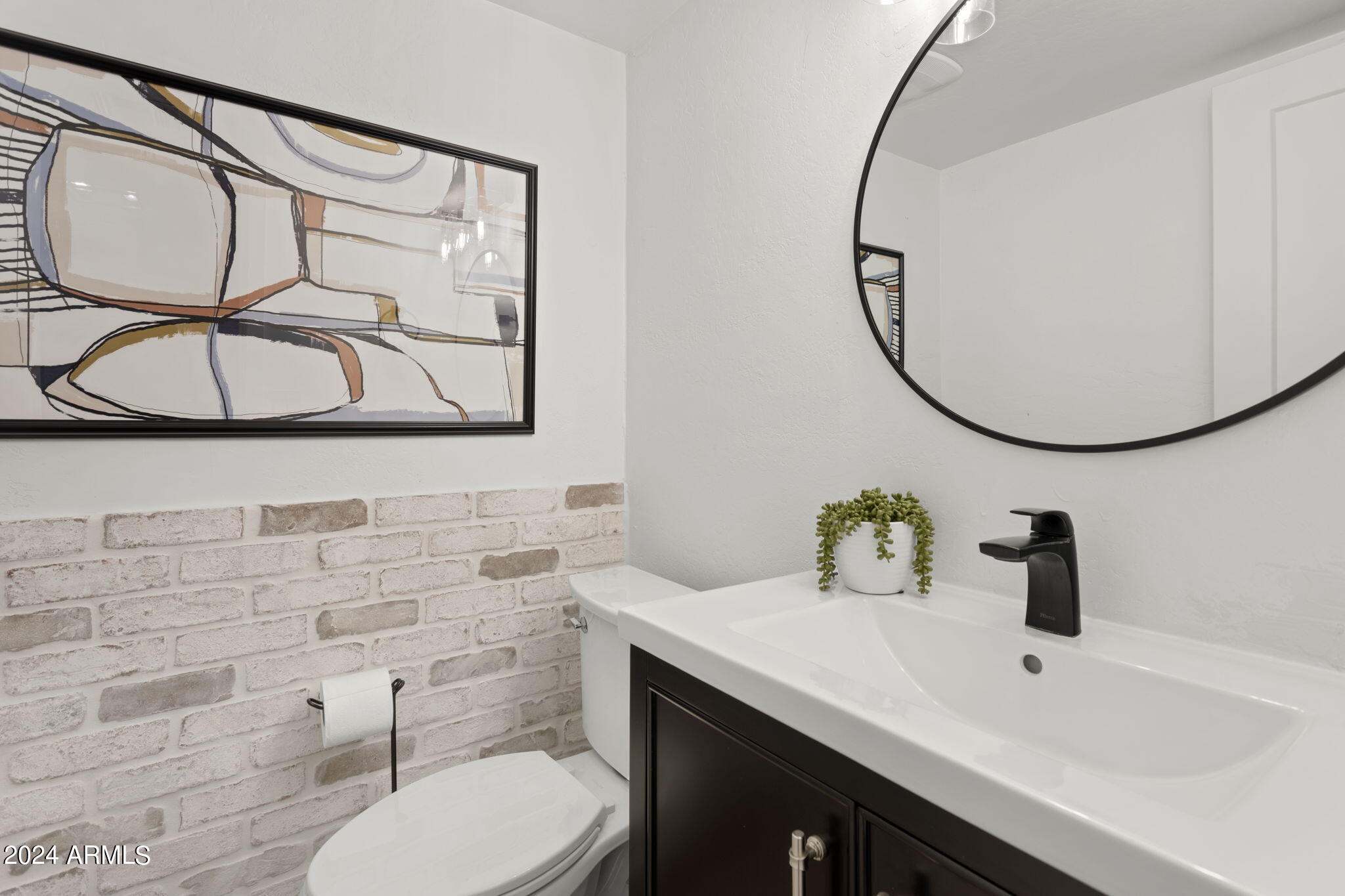 3136 North 38th Street, Unit 1 Phoenix, AZ 85018 - Photo 17 of 42 Half bath main level, perfect for guests