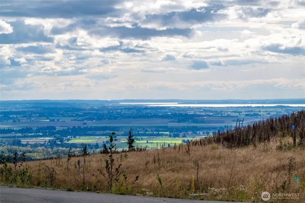 a view of a lake in middle of the town