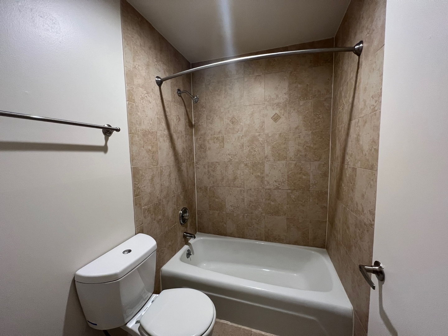 850 South Lorraine Road, Unit 3L Wheaton, IL 60189 - Photo 14 of 21 a bathroom with a toilet and a shower