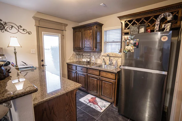 a living room with furniture fireplace and flat screen tv