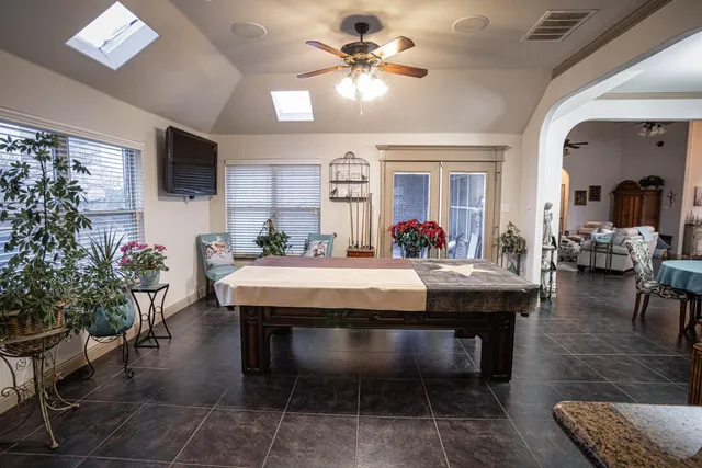 a utility room with faucet washer and dryer