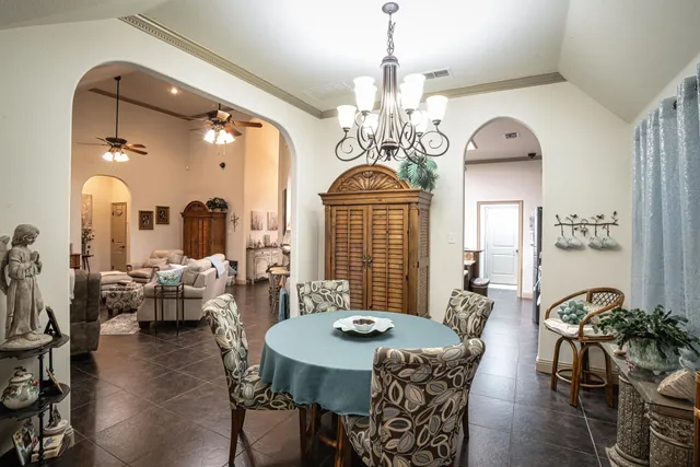 a kitchen with a refrigerator and a sink